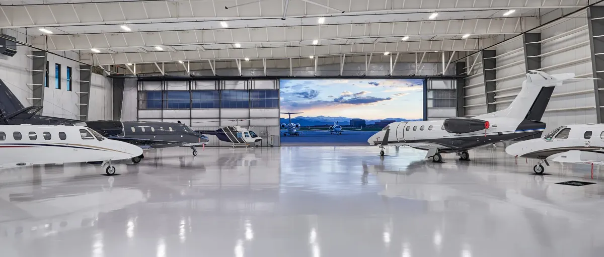 Managed business aircraft inside a private hangar